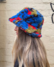 Cinnamon Creations Faux Fur Bucket Hat Red/Brown/Blue